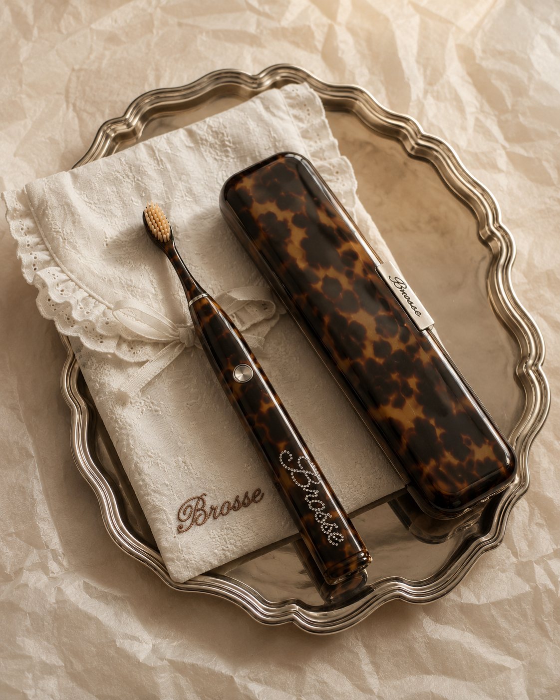 Classic Tort toothbrush and case on a silver tray